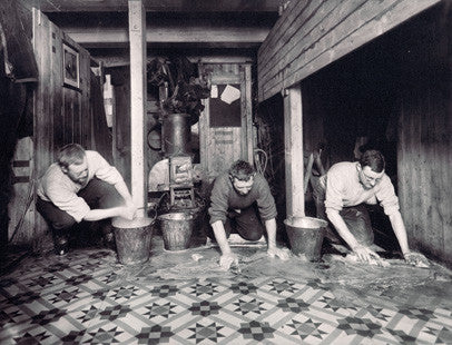 Wordie, Cheetham and Macklin washing the galley floor of the Endurance