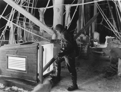 The nightwatchman returns after making an inspection of the ice