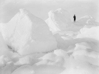 Man standing on ice field
