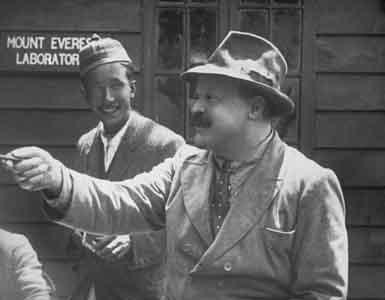 General Bruce addressing the Expedition's porters. In the background is the chief sirdar