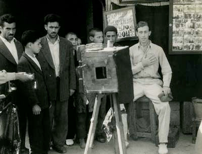 Hugh Carless sitting for a pilgrim photograph