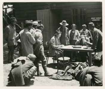 General Bruce examining expedition accounts