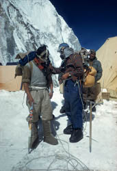 Edmund Hillary and Tenzing Norgay preparing oxygen equipment