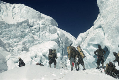 Sherpas with loads in the icefall