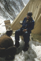 Hillary drinking tea at Camp IV after successfully ascending Everest