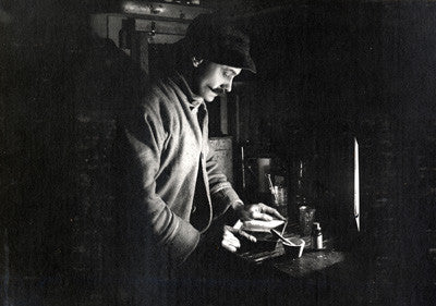 Herbert Ponting at work in the darkroom