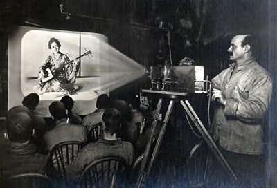 Herbert Ponting lecturing on Japan using lantern slides