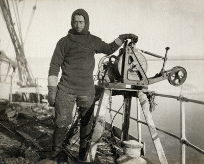 Lieut. Harry Rennick at the sounding machine on board Terra Nova