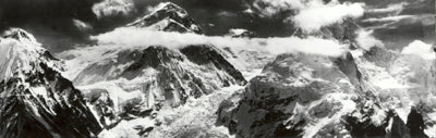 Landscape image of Mount Everest with clouds