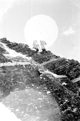 First assault. Evans and Bourdillon on rocks approach the south east ridge at 27,200 feet