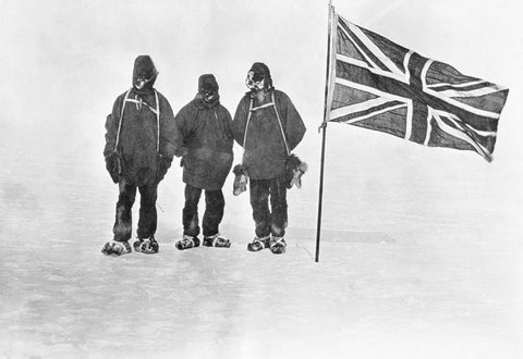 Shackleton, Adams and Wild beside the Union Jack at the farthest south