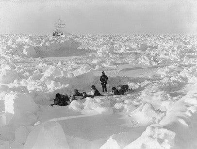 Dr. Leonard Hussey and dog team with Endurance frozen in the ice