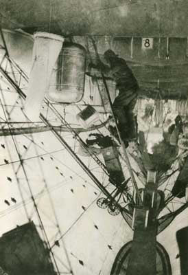 In the rigging of the Norge, showing flags to be dropped at the Pole