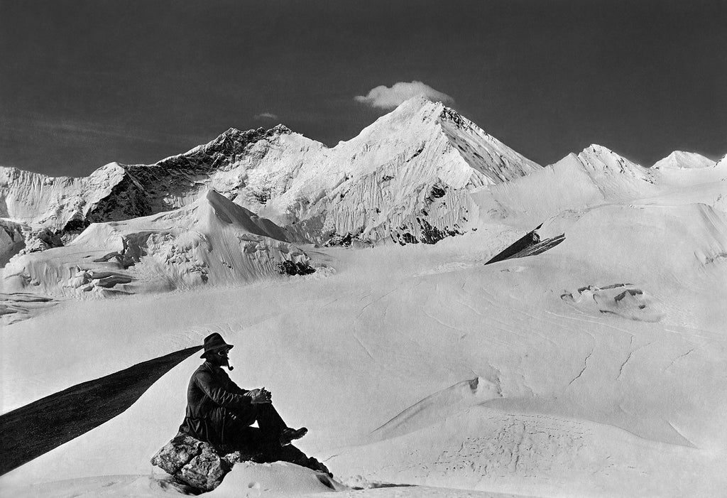 Team member in the foreground with Mount Everest (East side) in the distance
